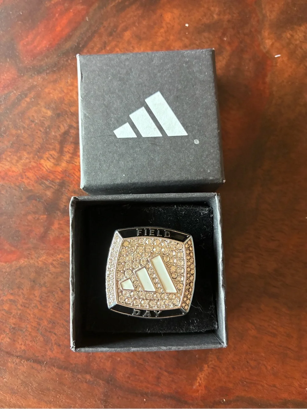 adidas Silver Tone Crystal Logo Ring with White Enamel Accents